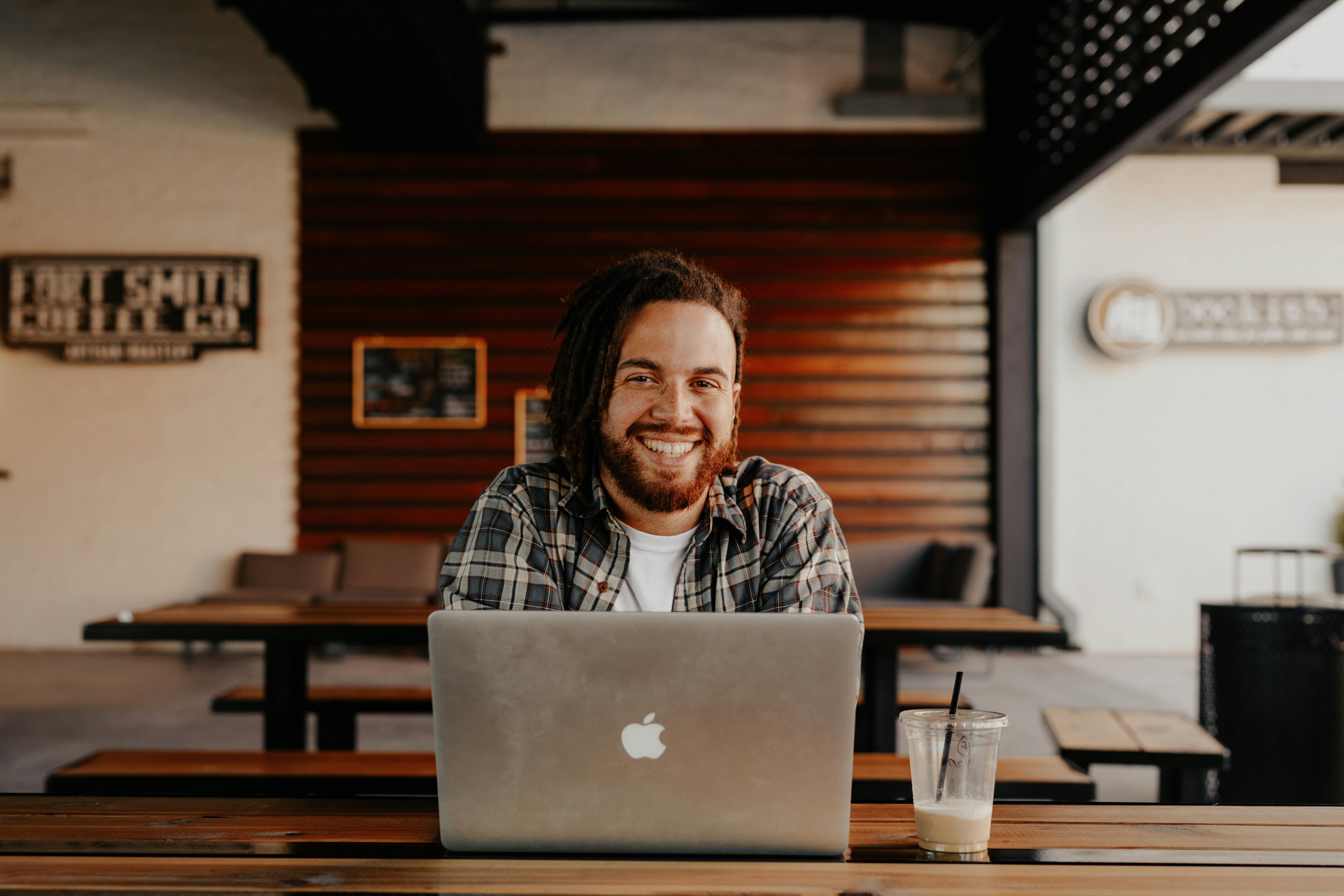Agency owner working from a coffee shop